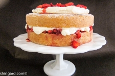 Creamy White Strawberry Shortcake on Cake Stand