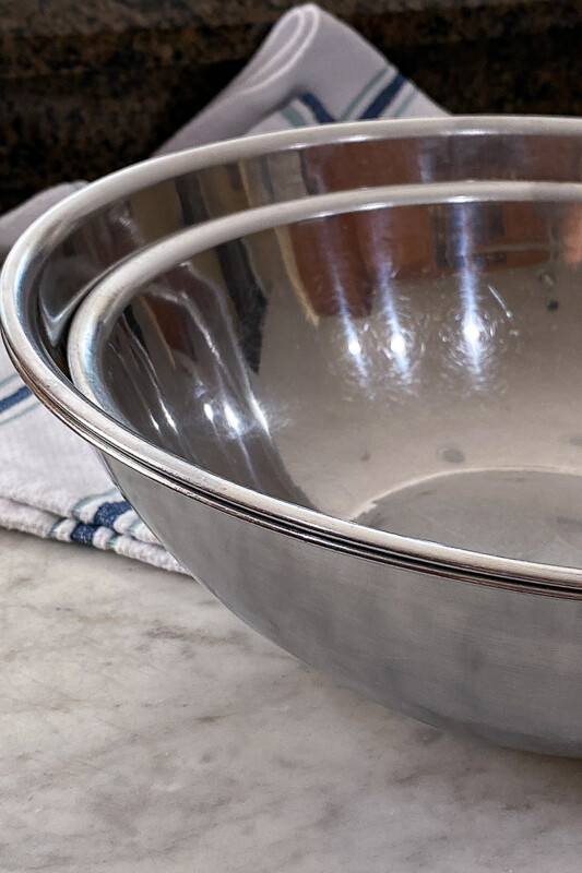 Large stainless steel mixing bowls.